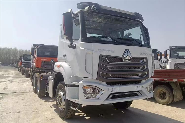 SINOTRUK Hohan NX Truck Price 371 hp 10 Wheeler for Sale In Tanzania - Tractor: foto 1 SINOTRUK Hohan NX Truck Price 371 hp 10 Wheeler for Sale In Tanzania - Tractor: foto 1