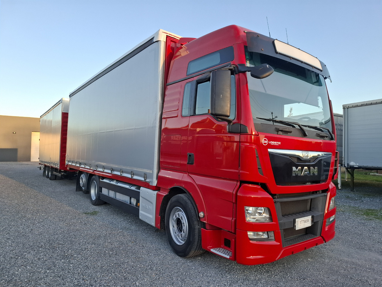 MAN TGX 26.440 E6 + SCHMITZ - Camião de lona: foto 4 MAN TGX 26.440 E6 + SCHMITZ - Camião de lona: foto 4