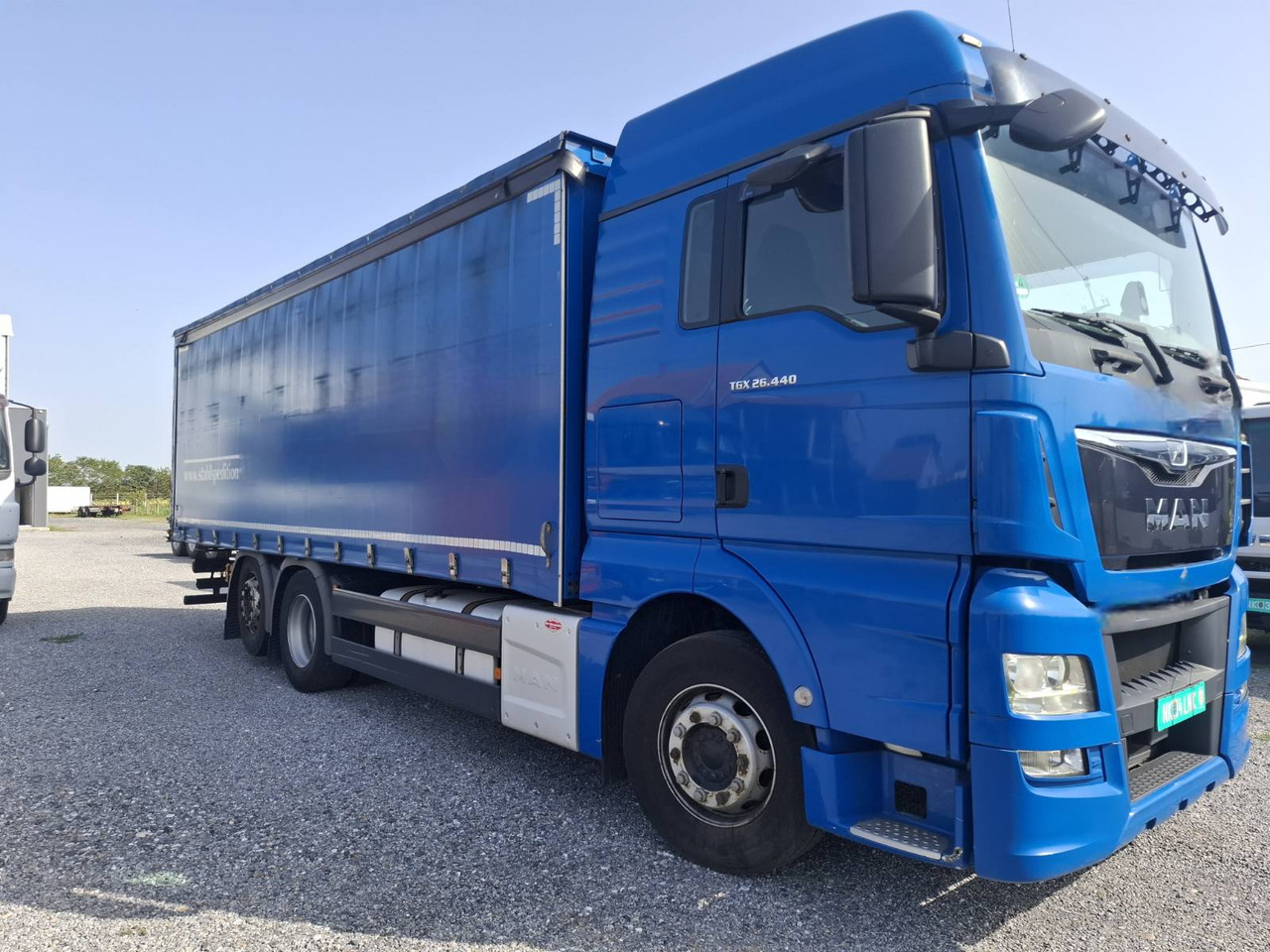 MAN TGX 26.440 E6 - Camião de lona: foto 1 MAN TGX 26.440 E6 - Camião de lona: foto 1