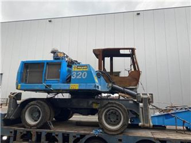 Fuchs MHL 320 (For parts) - Manipulador de material: foto 1 Fuchs MHL 320 (For parts) - Manipulador de material: foto 1