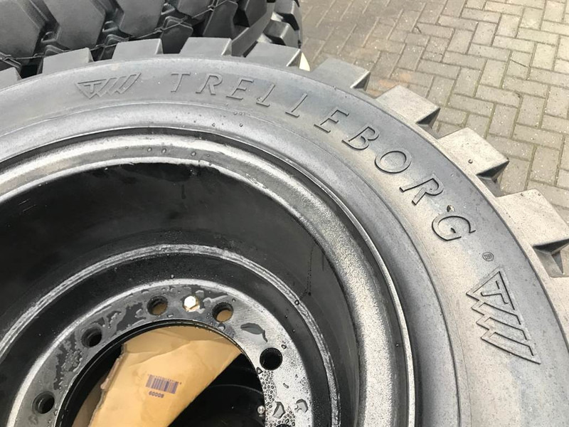 Trelleborg 10.00-20 Dual excavator solid-Tyre/Reifen/Banden - Jantes e pneus para Máquina de construção: foto 4 Trelleborg 10.00-20 Dual excavator solid-Tyre/Reifen/Banden - Jantes e pneus para Máquina de construção: foto 4