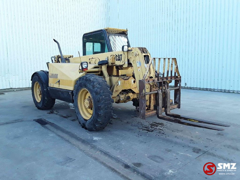 Caterpillar TH 62 - Empilhador telescópico: foto 1 Caterpillar TH 62 - Empilhador telescópico: foto 1