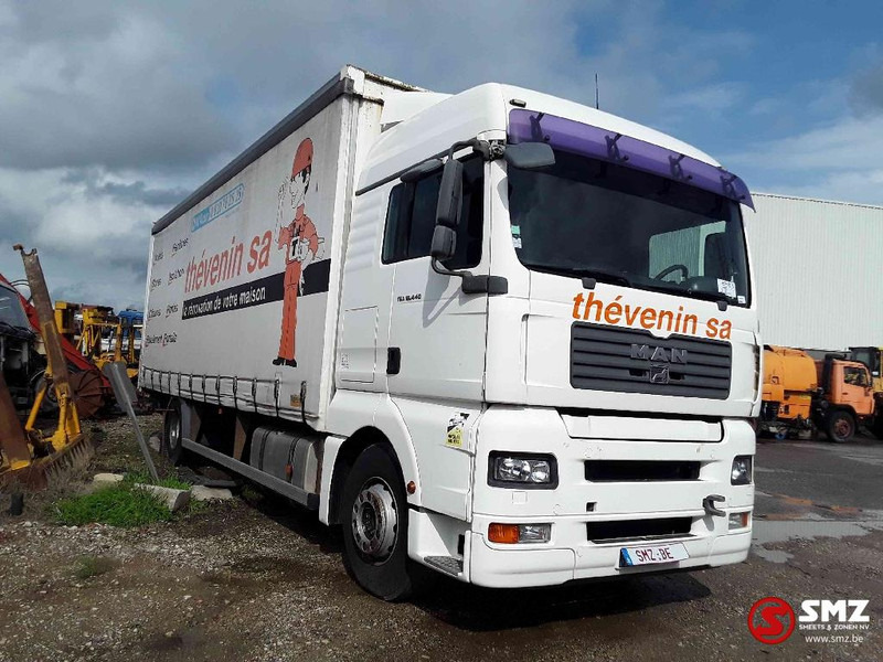 MAN TGA 18.440 - Camião de lona: foto 1 MAN TGA 18.440 - Camião de lona: foto 1