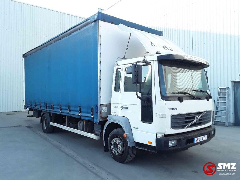Volvo FL6 180 lames-steel - Camião de lona: foto 1 Volvo FL6 180 lames-steel - Camião de lona: foto 1