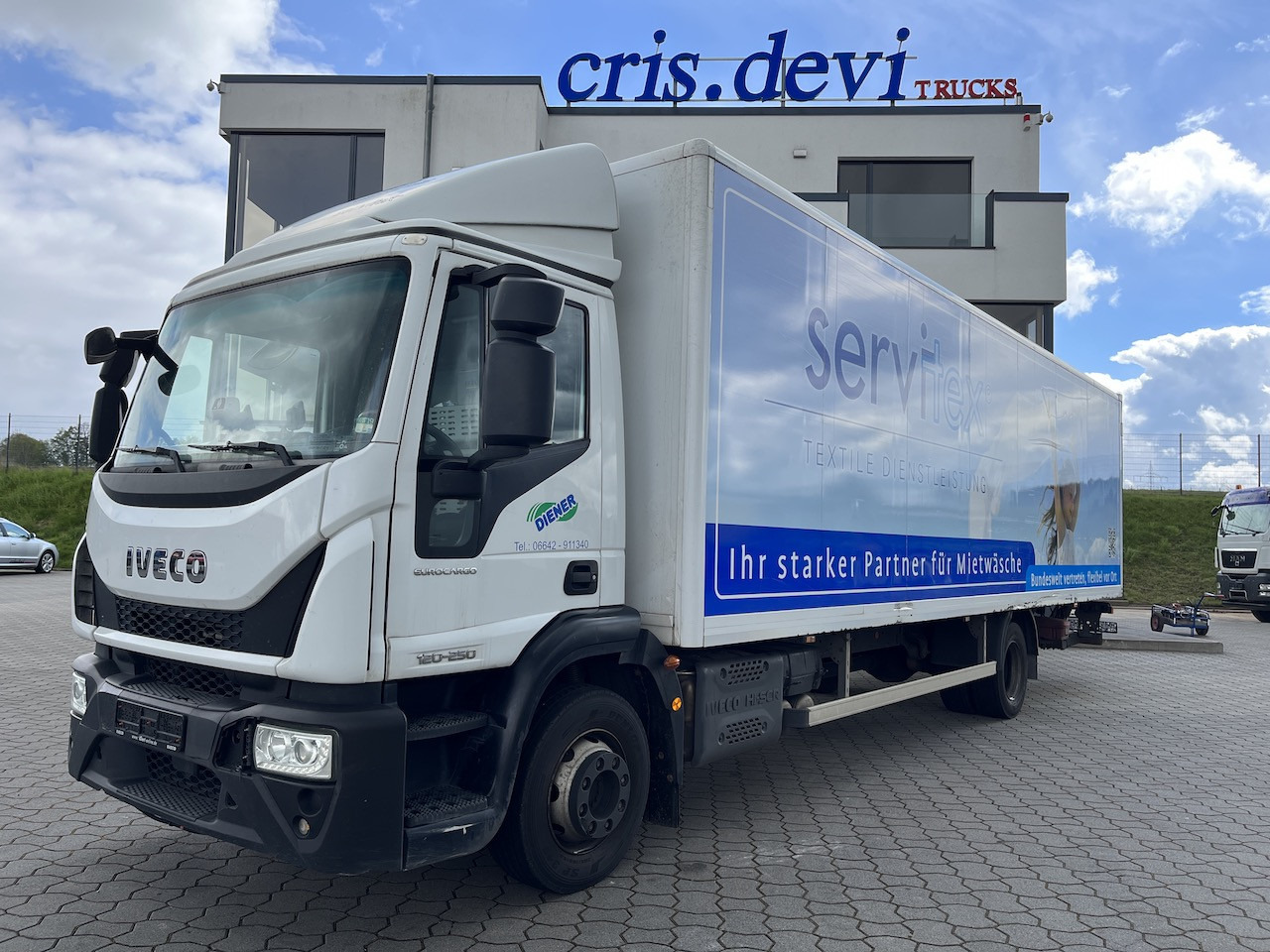 Iveco 120E25 Eurocargo 4x2 Koffer | Ladebordwand - Camião furgão: foto 1 Iveco 120E25 Eurocargo 4x2 Koffer | Ladebordwand - Camião furgão: foto 1