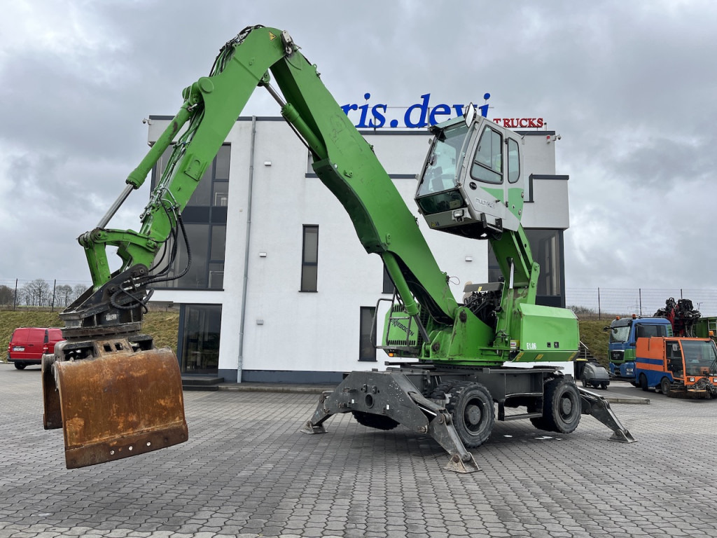 Sennebogen 818 Umschlagbagger Greifer - Escavadeira de rodas: foto 1 Sennebogen 818 Umschlagbagger Greifer - Escavadeira de rodas: foto 1