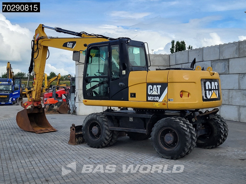 Caterpillar M313 D - Escavadeira de rodas: foto 2 Caterpillar M313 D - Escavadeira de rodas: foto 2