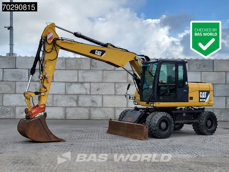 Caterpillar M313 D - Escavadeira de rodas: foto 1 Caterpillar M313 D - Escavadeira de rodas: foto 1