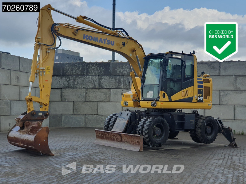 Komatsu PW148 -11 - Escavadeira de rodas: foto 1 Komatsu PW148 -11 - Escavadeira de rodas: foto 1
