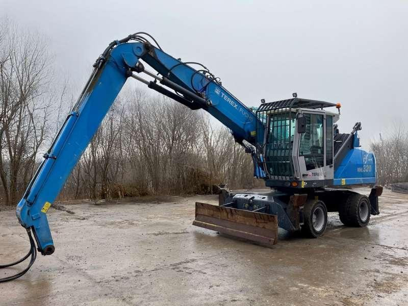 Fuchs MHL 320 - Manipulador de material: foto 1 Fuchs MHL 320 - Manipulador de material: foto 1