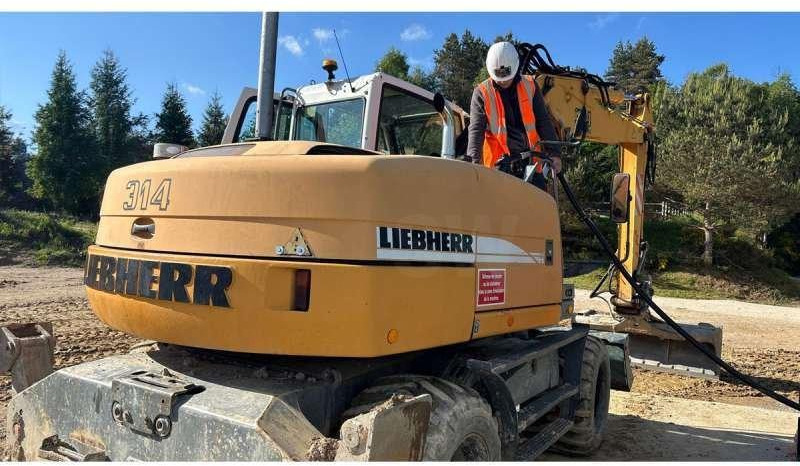 Liebherr A314 Litronic - Escavadeira de rodas: foto 3 Liebherr A314 Litronic - Escavadeira de rodas: foto 3