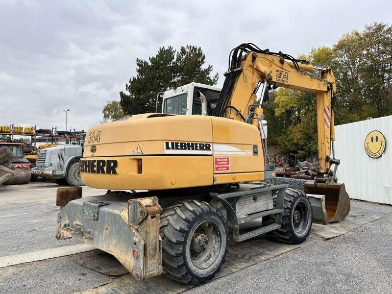 Liebherr A314 Litronic - Escavadeira de rodas: foto 5 Liebherr A314 Litronic - Escavadeira de rodas: foto 5