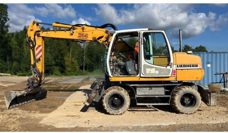 Liebherr A314 Litronic - Escavadeira de rodas: foto 1 Liebherr A314 Litronic - Escavadeira de rodas: foto 1