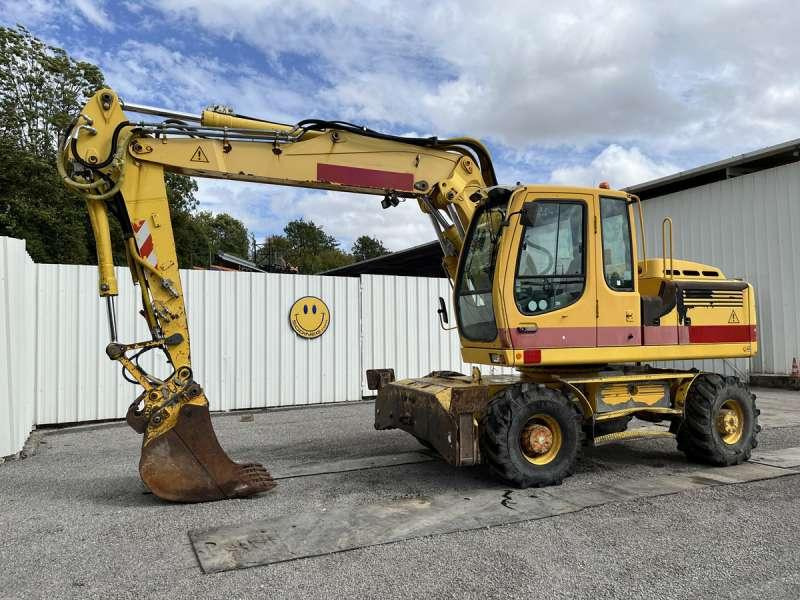 Liebherr Pelle sur Pneus A900C LITRONIC - Escavadeira de rodas: foto 1 Liebherr Pelle sur Pneus A900C LITRONIC - Escavadeira de rodas: foto 1