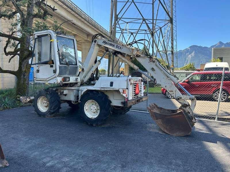 Mecalac 8CXI - Escavadeira de rodas: foto 1 Mecalac 8CXI - Escavadeira de rodas: foto 1