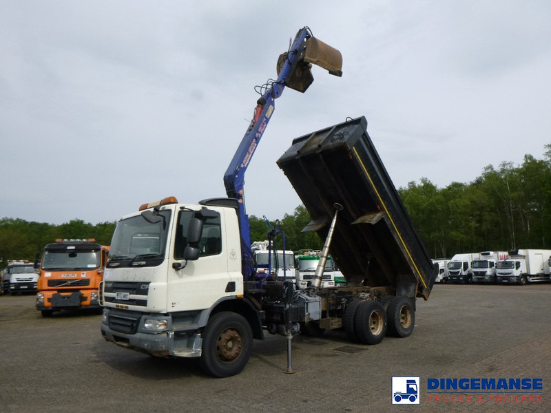 DAF CF 75.310 6x4 RHD tipper + HMF 1144 K-1 + grapple - Camião grua: foto 1 DAF CF 75.310 6x4 RHD tipper + HMF 1144 K-1 + grapple - Camião grua: foto 1