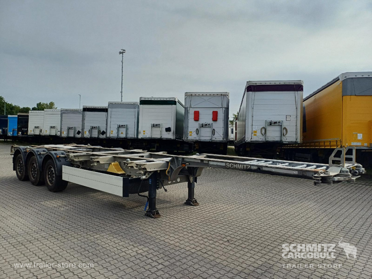 SCHMITZ Auflieger Containerfahrgestell Standard - Semi-reboque transportador de contêineres/ Caixa móvel: foto 1 SCHMITZ Auflieger Containerfahrgestell Standard - Semi-reboque transportador de contêineres/ Caixa móvel: foto 1
