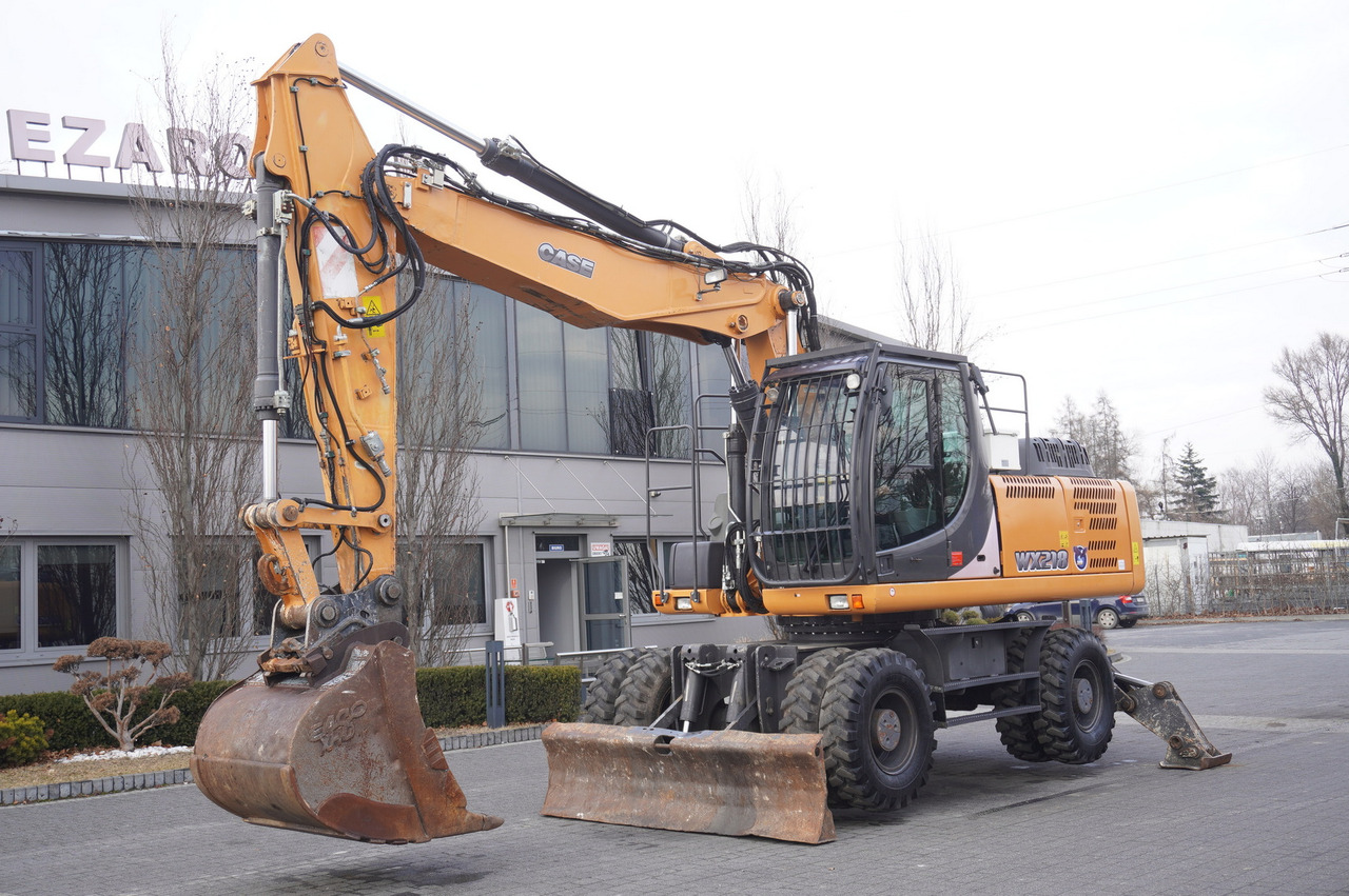 CASE WX218 / 23t wheeled excavator / 3 times folding arm - Escavadeira de rodas: foto 2 CASE WX218 / 23t wheeled excavator / 3 times folding arm - Escavadeira de rodas: foto 2