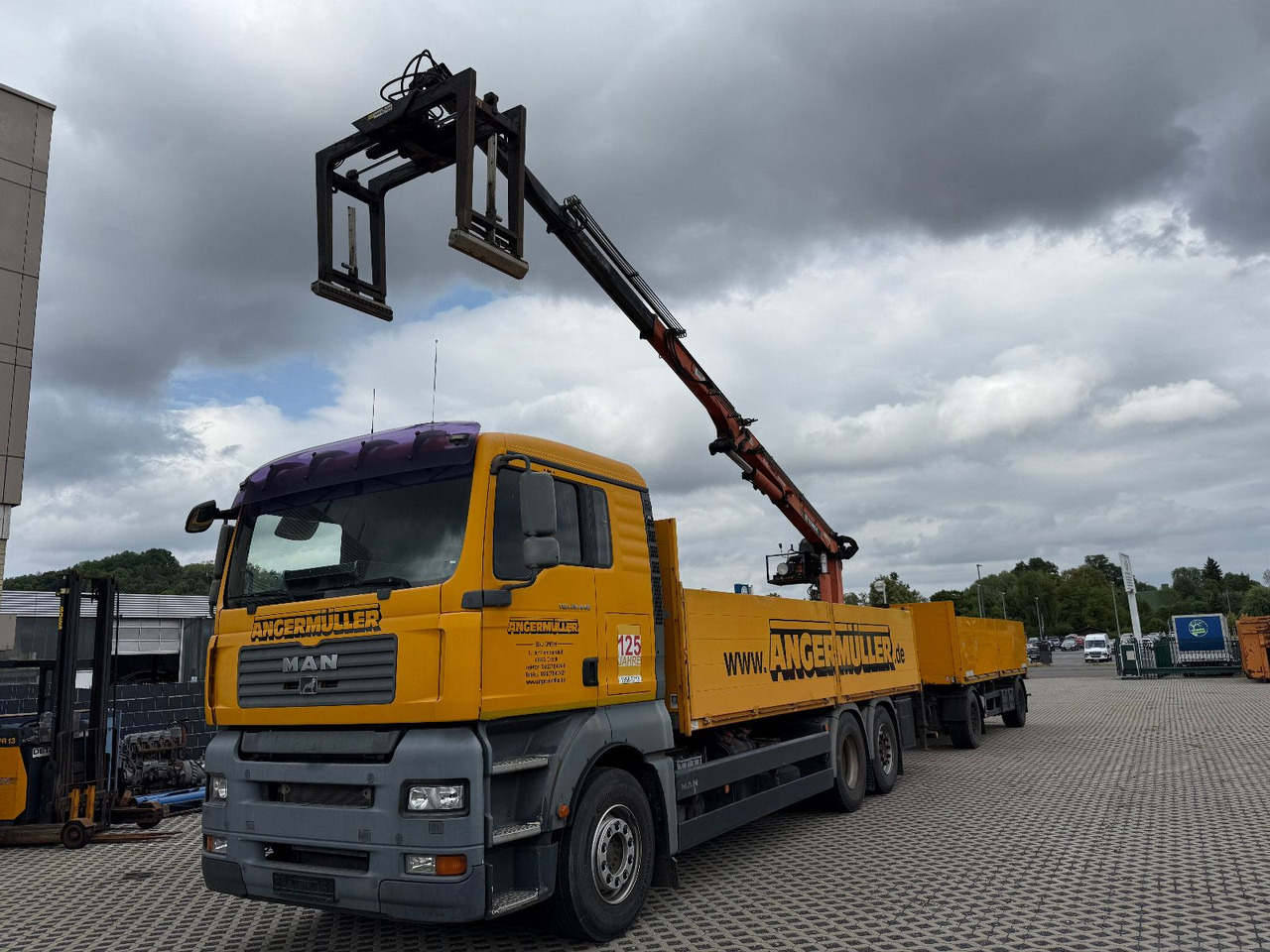 MAN TGA 26,440 TEREX TLC 165,2-A19 ACM SYSTEM - Camião grua: foto 1 MAN TGA 26,440 TEREX TLC 165,2-A19 ACM SYSTEM - Camião grua: foto 1