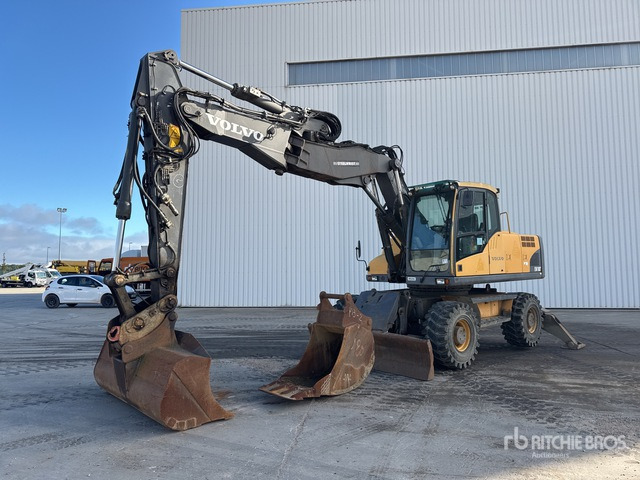 Volvo EW180 Pelle hydraulique sur roues - Escavadeira de rodas: foto 1 Volvo EW180 Pelle hydraulique sur roues - Escavadeira de rodas: foto 1