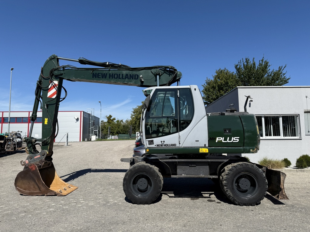New Holland MH-Plus (111695) - Escavadeira de rodas: foto 1 New Holland MH-Plus (111695) - Escavadeira de rodas: foto 1