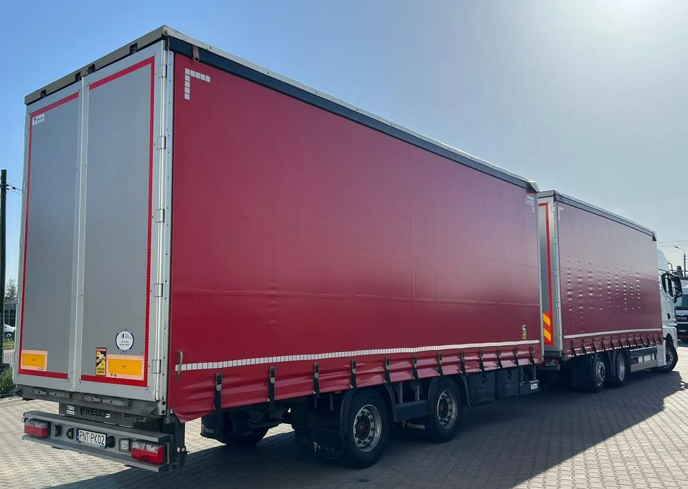 MAN TGX 26.470 z przyczepą Redos - Camião de lona: foto 5 MAN TGX 26.470 z przyczepą Redos - Camião de lona: foto 5