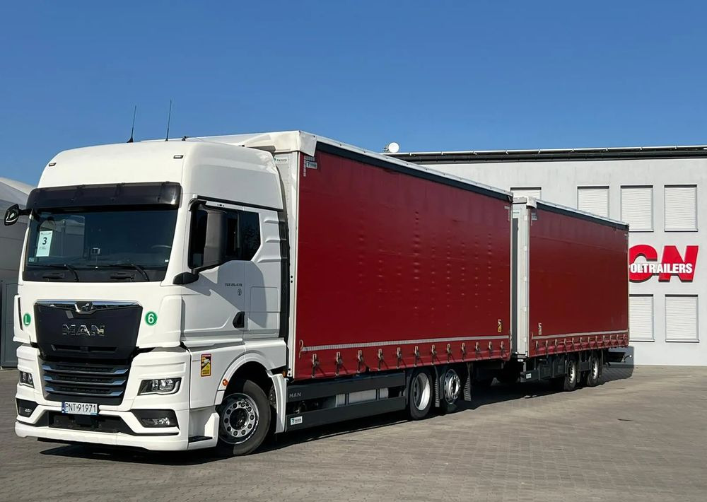 MAN TGX 26.470 z przyczepą Redos - Camião de lona, Reboque de lona: foto 1 MAN TGX 26.470 z przyczepą Redos - Camião de lona, Reboque de lona: foto 1