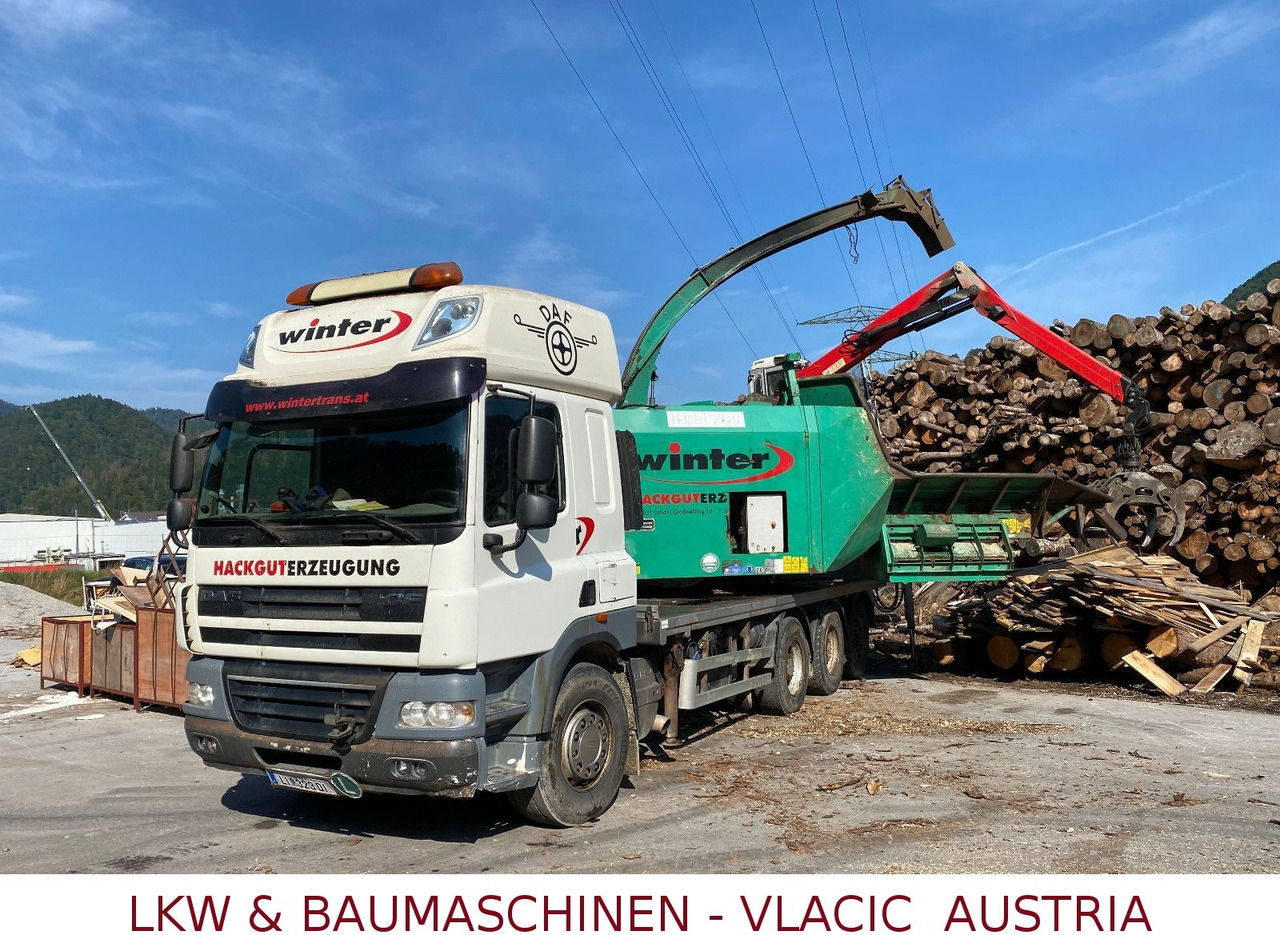 DAF CF85 Holzhackmaschine JENZ HEM 700 - Camião de transporte de madeira: foto 1 DAF CF85 Holzhackmaschine JENZ HEM 700 - Camião de transporte de madeira: foto 1