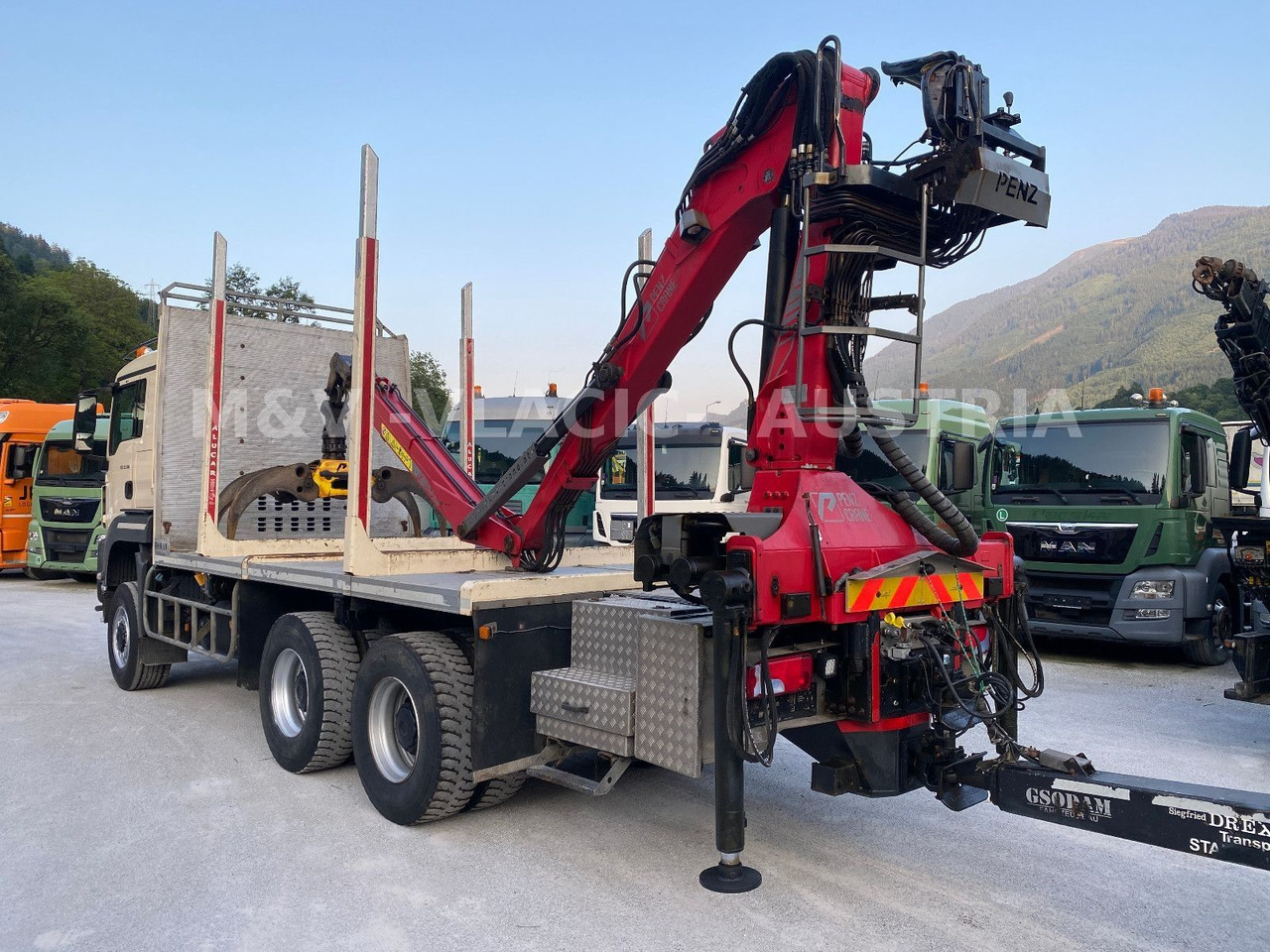 MAN 33.500 6X6 mit Kran PENZ 12Z - Camião de transporte de madeira, Camião grua: foto 4 MAN 33.500 6X6 mit Kran PENZ 12Z - Camião de transporte de madeira, Camião grua: foto 4