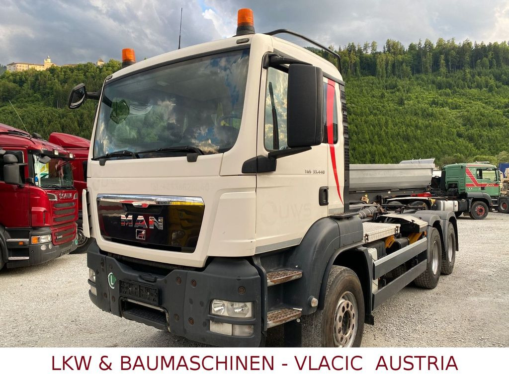 MAN TGS 33.440 (6x4) EEV Abrollkipper MAN TGS 33.440 (6x4) EEV Abrollkipper - Camião polibenne: foto 1 MAN TGS 33.440 (6x4) EEV Abrollkipper MAN TGS 33.440 (6x4) EEV Abrollkipper - Camião polibenne: foto 1