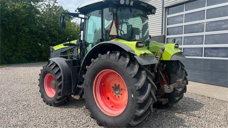 Claas ARION 550 CEBIS Med frontlæsser og frontlift - Trator: foto 3 Claas ARION 550 CEBIS Med frontlæsser og frontlift - Trator: foto 3