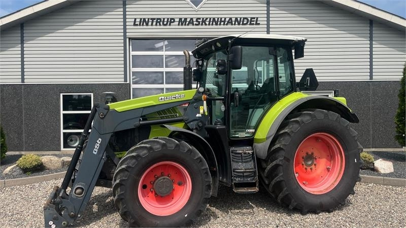Claas ARION 550 CEBIS Med frontlæsser og frontlift - Trator: foto 1 Claas ARION 550 CEBIS Med frontlæsser og frontlift - Trator: foto 1