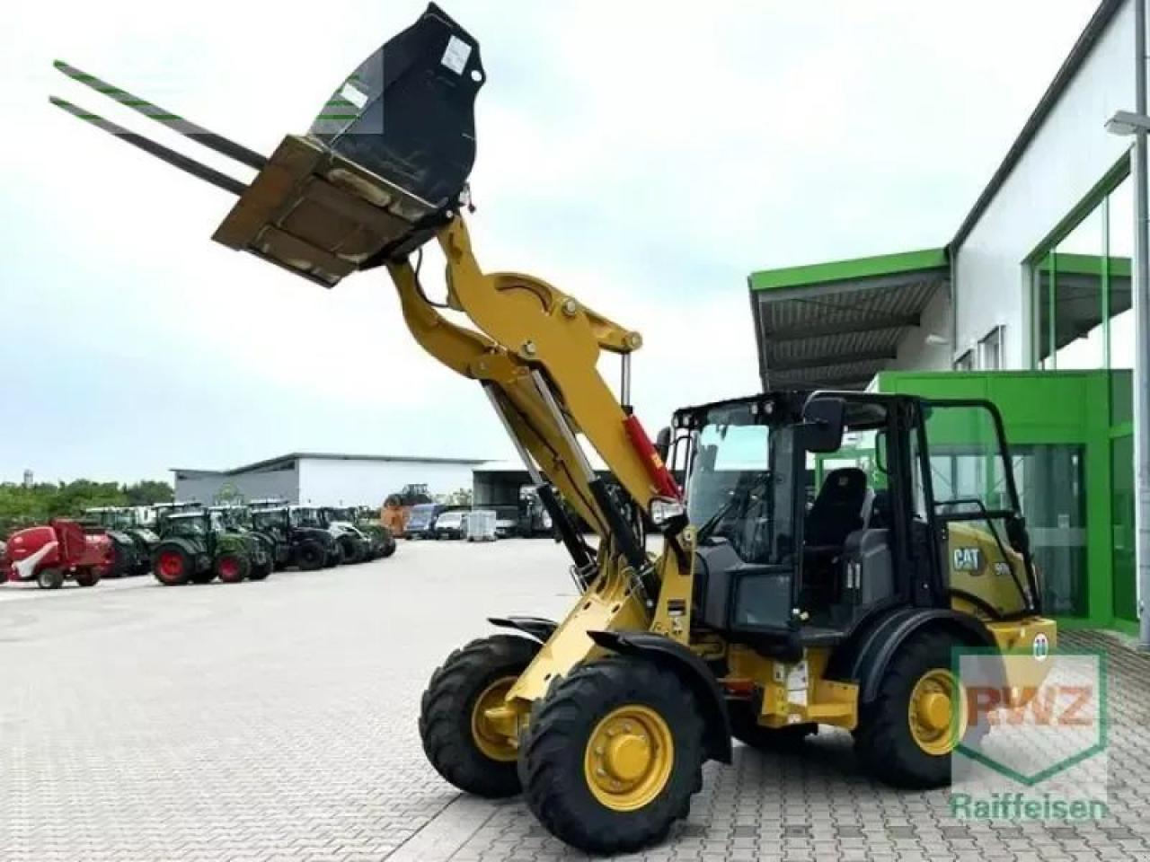 Caterpillar 906 radlader - Mini escavadeira: foto 1 Caterpillar 906 radlader - Mini escavadeira: foto 1