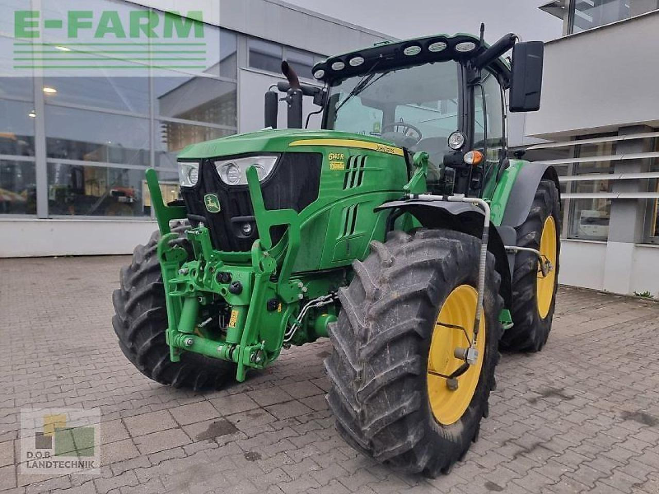 John Deere 6145r 6145 r mit konsolen - Trator: foto 1 John Deere 6145r 6145 r mit konsolen - Trator: foto 1