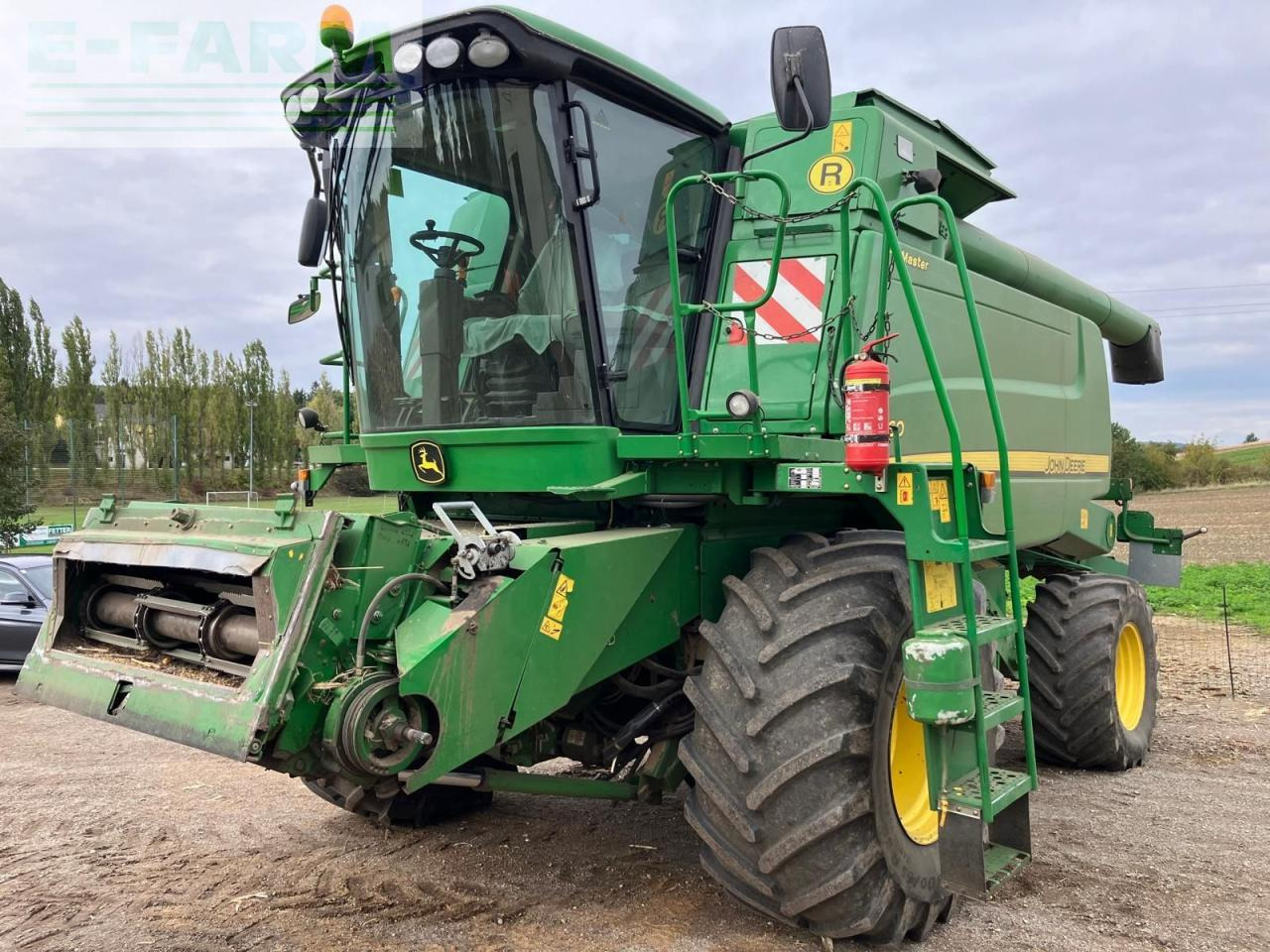 John Deere W660 HM - Ceifeira debulhadora: foto 1 John Deere W660 HM - Ceifeira debulhadora: foto 1