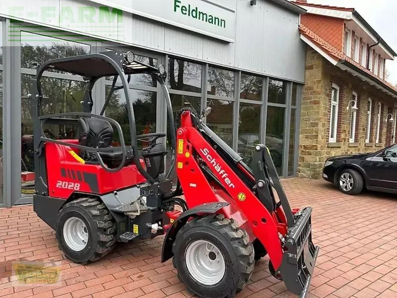 Schäffer 2028 - 2 euro-aufnahme - Pá carregadora de rodas: foto 1 Schäffer 2028 - 2 euro-aufnahme - Pá carregadora de rodas: foto 1