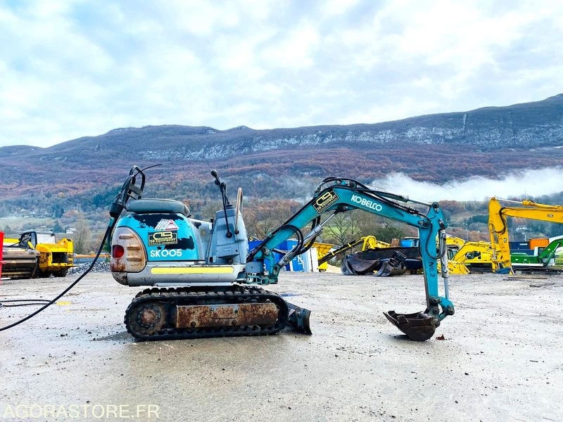 Mini-pelle électrique sur groupe KOBELCO SK005 - Année 1993 - Escavadeira: foto 4 Mini-pelle électrique sur groupe KOBELCO SK005 - Année 1993 - Escavadeira: foto 4