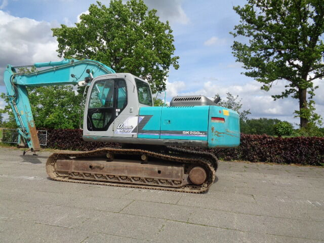 Kobelco SK250NLC - Escavadora de rastos: foto 1 Kobelco SK250NLC - Escavadora de rastos: foto 1