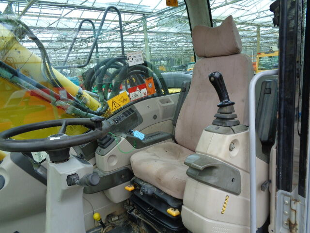 Escavadeira de rodas New Holland MH 4.6: foto 8