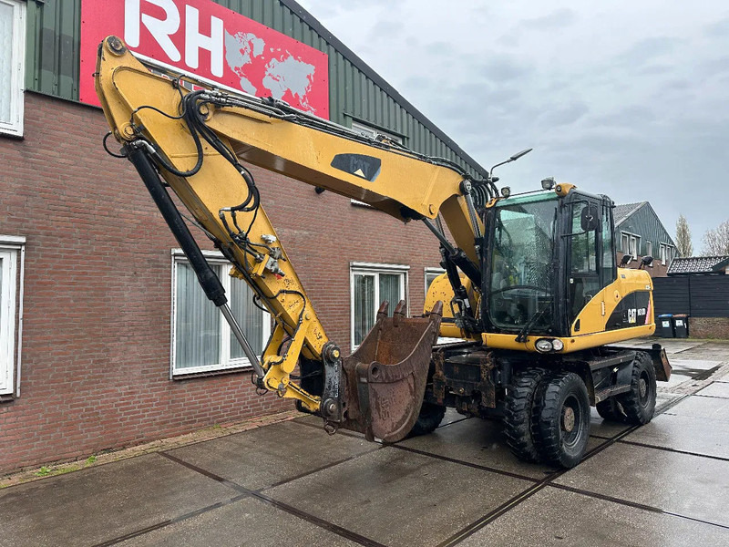 Caterpillar M313D 7212 HOURS - Escavadeira de rodas: foto 2 Caterpillar M313D 7212 HOURS - Escavadeira de rodas: foto 2