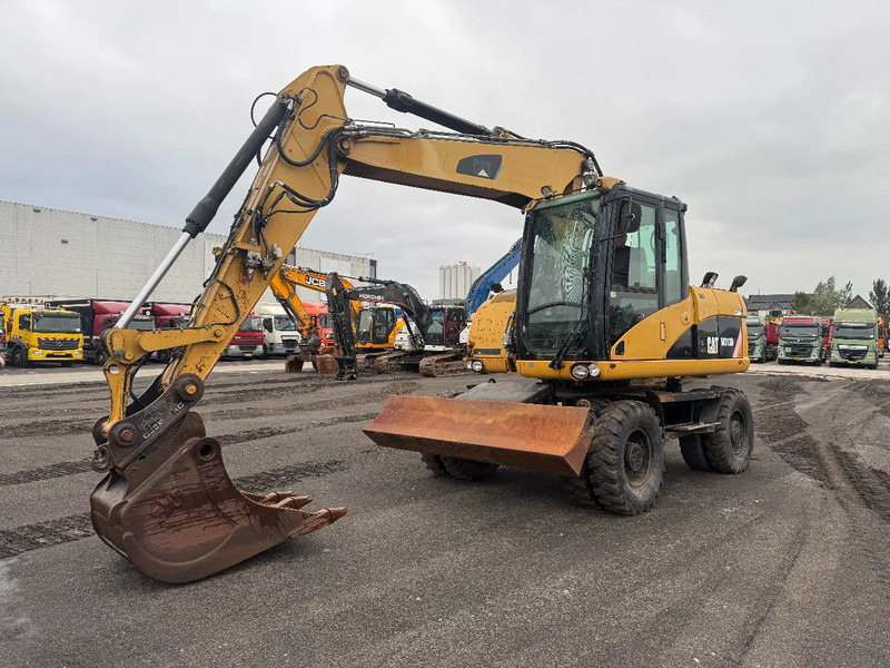 Caterpillar M313D 7212 HOURS - Escavadeira de rodas: foto 4 Caterpillar M313D 7212 HOURS - Escavadeira de rodas: foto 4