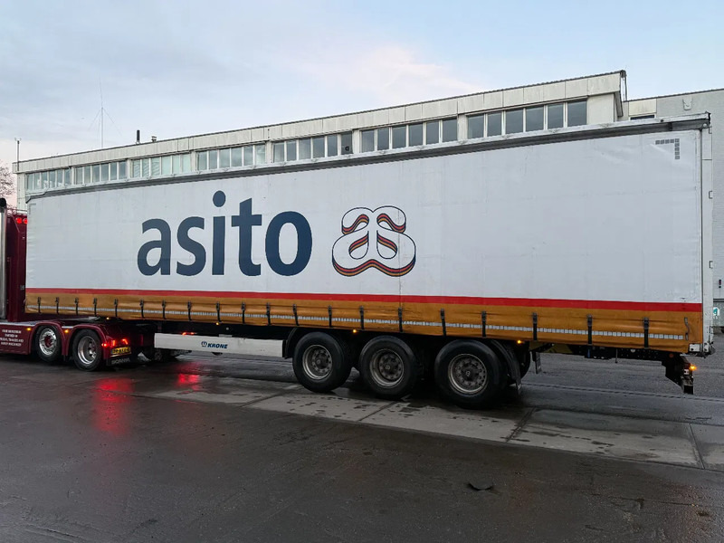 Krone WITH ALUMINIUM SIDEBOARDS, BPW AXLES, SLIDING ROOF - Semi-reboque de lona: foto 4 Krone WITH ALUMINIUM SIDEBOARDS, BPW AXLES, SLIDING ROOF - Semi-reboque de lona: foto 4