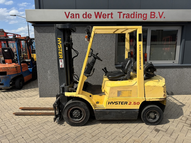 Hyster H2.50XM Triplo 470 Freelift / Sideshift LPG 1995 - Empilhador a gás: foto 1 Hyster H2.50XM Triplo 470 Freelift / Sideshift LPG 1995 - Empilhador a gás: foto 1