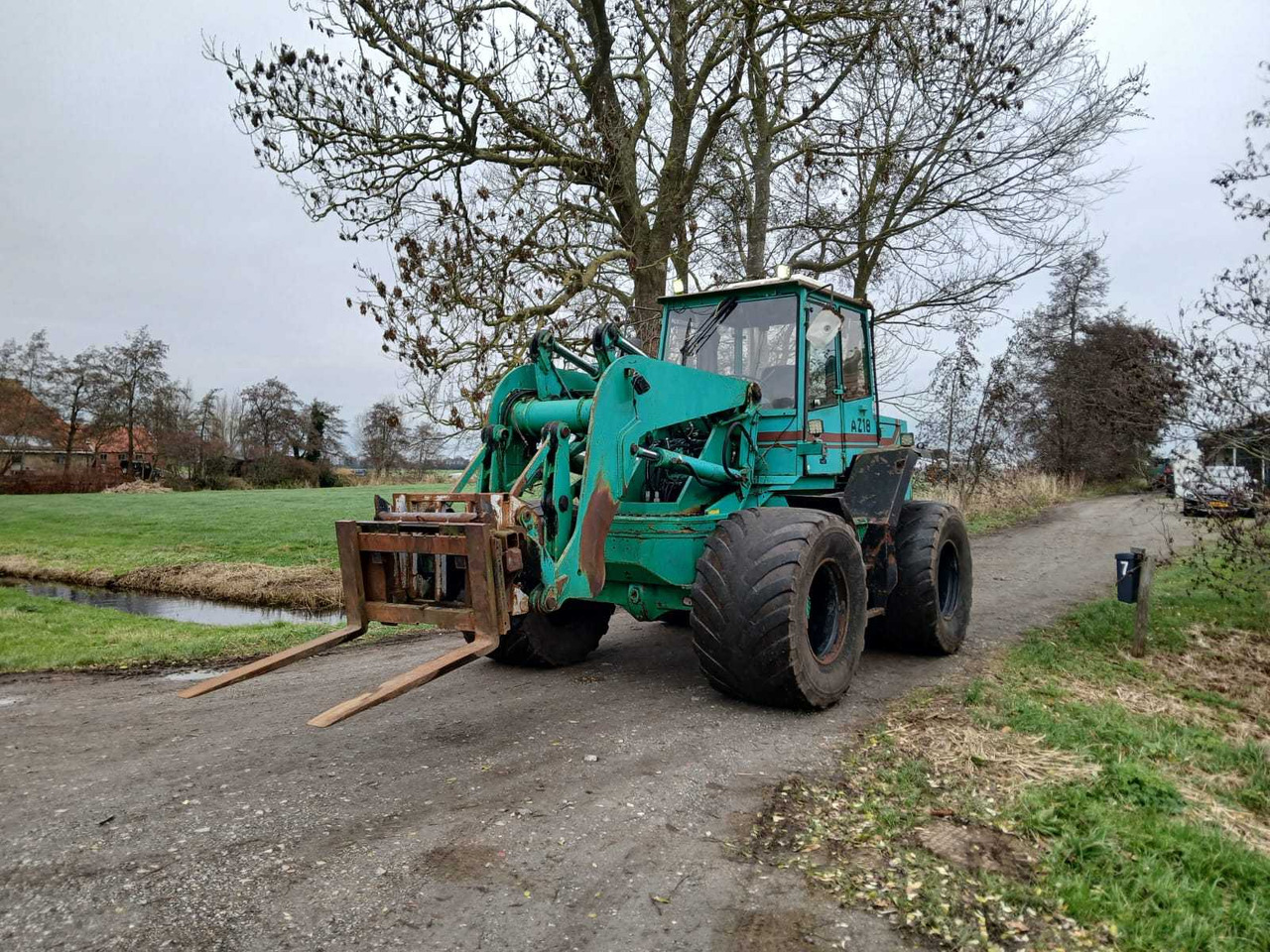 1996 AHLMANN AZ18 SHOVEL - Pá carregadora de rodas: foto 1 1996 AHLMANN AZ18 SHOVEL - Pá carregadora de rodas: foto 1