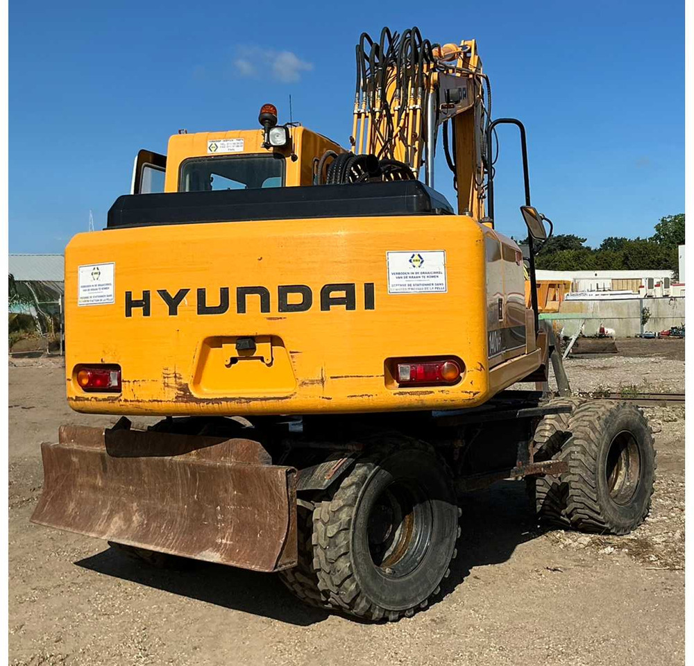 Hyundai Robex140W-7 - Escavadeira de rodas: foto 4 Hyundai Robex140W-7 - Escavadeira de rodas: foto 4