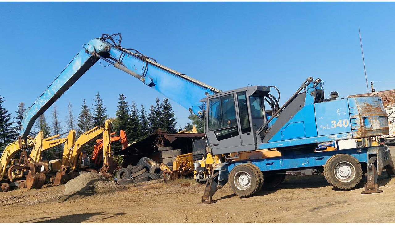 TEREX FUCHS MHL 340 - Escavadeira de rodas: foto 2 TEREX FUCHS MHL 340 - Escavadeira de rodas: foto 2