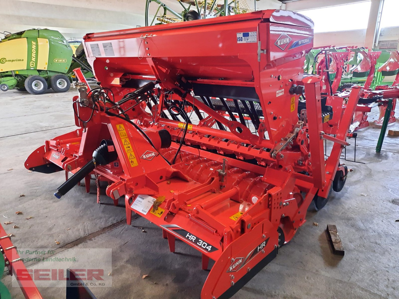 Kuhn HR 304 + Sitera 330-20E - Semeadora combinada: foto 1 Kuhn HR 304 + Sitera 330-20E - Semeadora combinada: foto 1