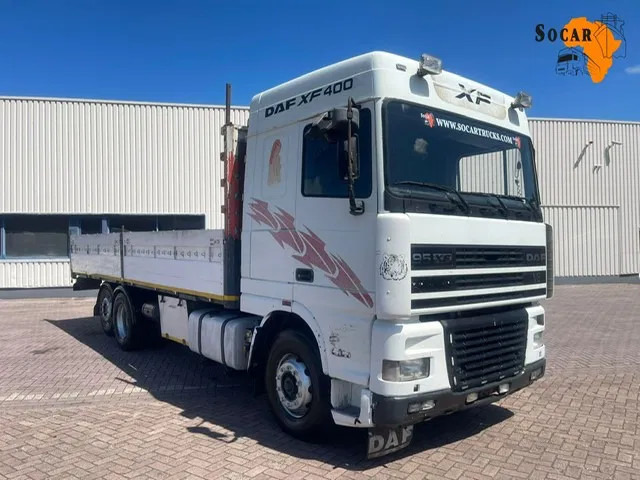 DAF XF 95 8 Tires (6x2) euro 2 - Camião de caixa aberta/ Plataforma: foto 1 DAF XF 95 8 Tires (6x2) euro 2 - Camião de caixa aberta/ Plataforma: foto 1