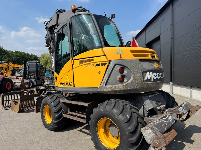 Mecalac 714MW FULL ATTACHMENTS OVERCOMPLEET !!! - Escavadeira de rodas: foto 4 Mecalac 714MW FULL ATTACHMENTS OVERCOMPLEET !!! - Escavadeira de rodas: foto 4