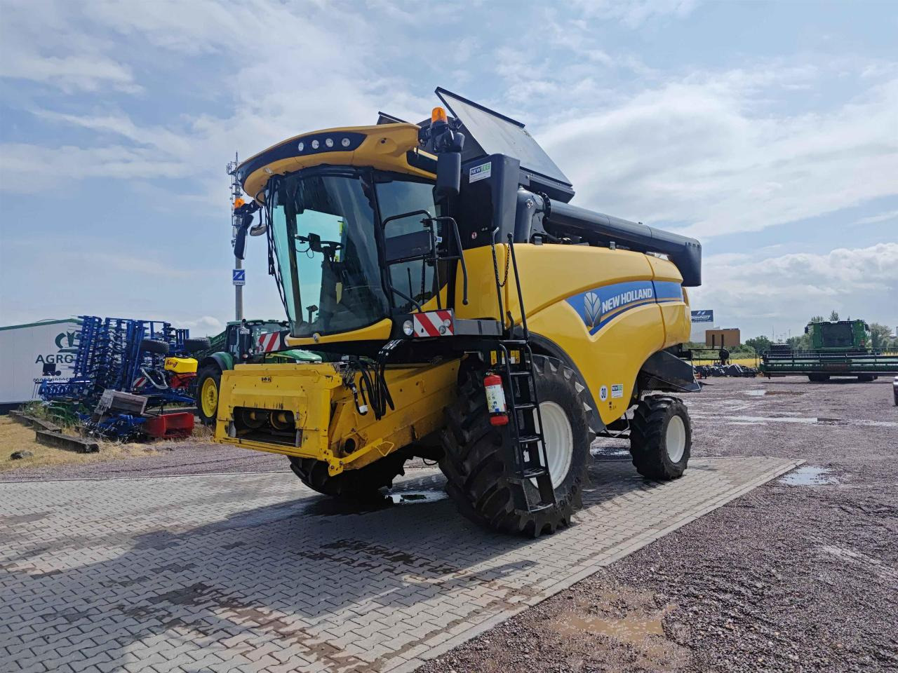 New Holland CX 5.80 - Ceifeira debulhadora: foto 1 New Holland CX 5.80 - Ceifeira debulhadora: foto 1